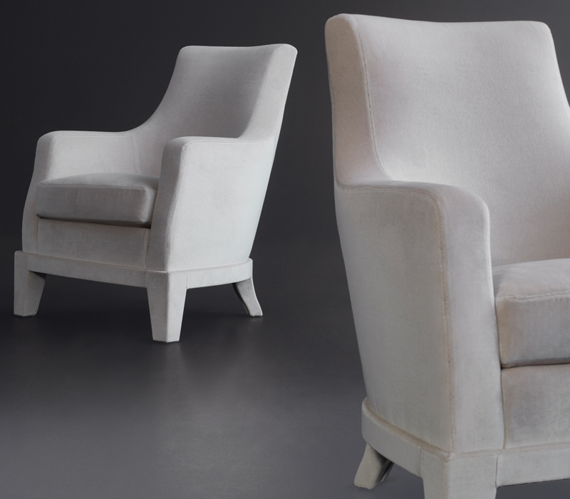 Aziza is a wooden armchair covered in fabric or leather, from Promemoria's catalogue | Promemoria