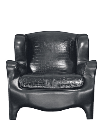 Club is an armchair with an inside covering in fabric or leather and an outer covering in leather, from Promemoria's catalogue | Promemoria