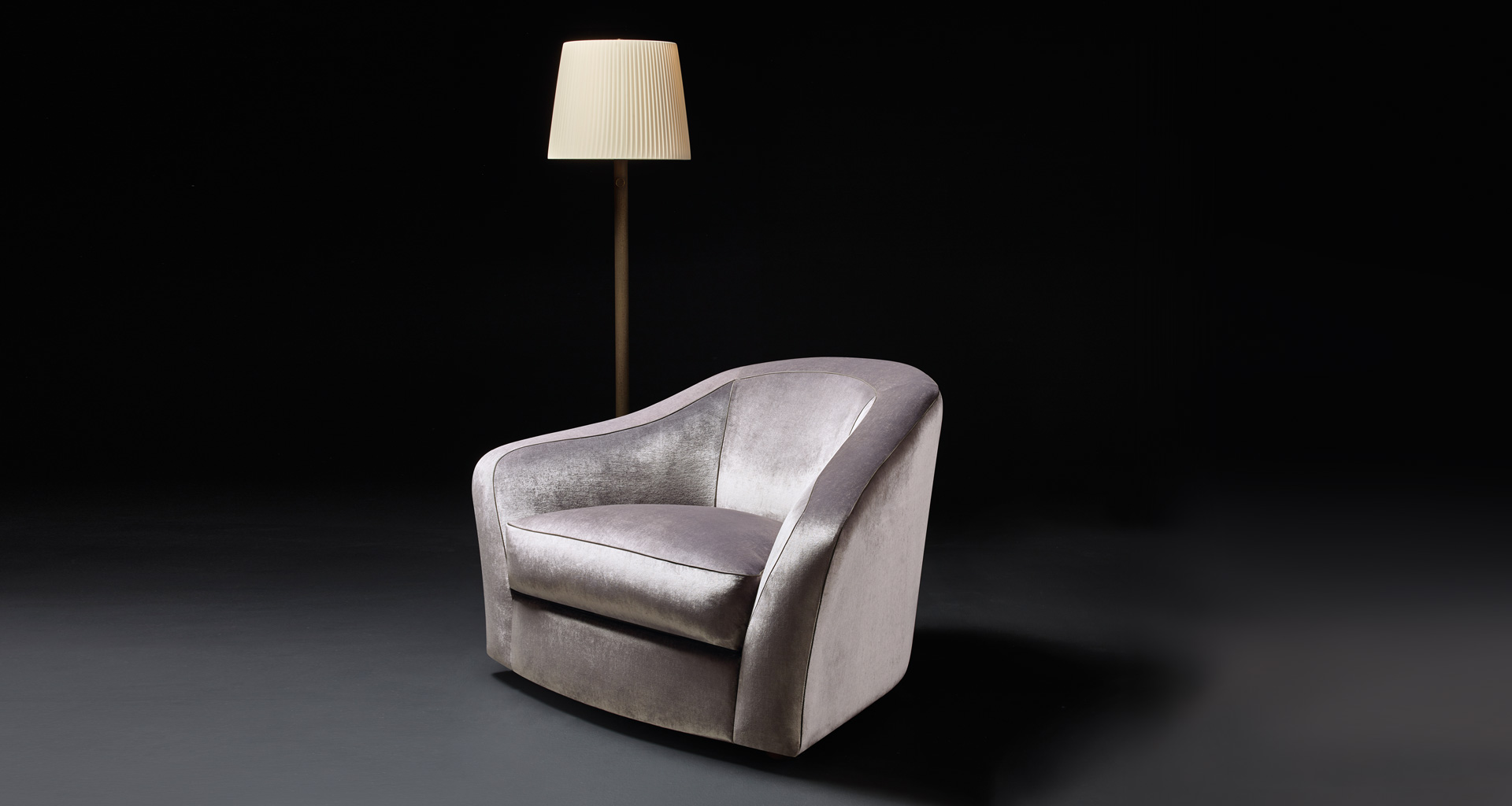 Fiore di Loto is an armchair for two covered in fabric or leather, from Promemoria's catalogue | Promemoria