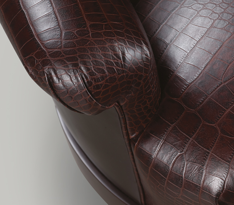 Detail of Gacy, a wooden armchair covered in fabric or leather, from Promemoria's catalogue | Promemoria