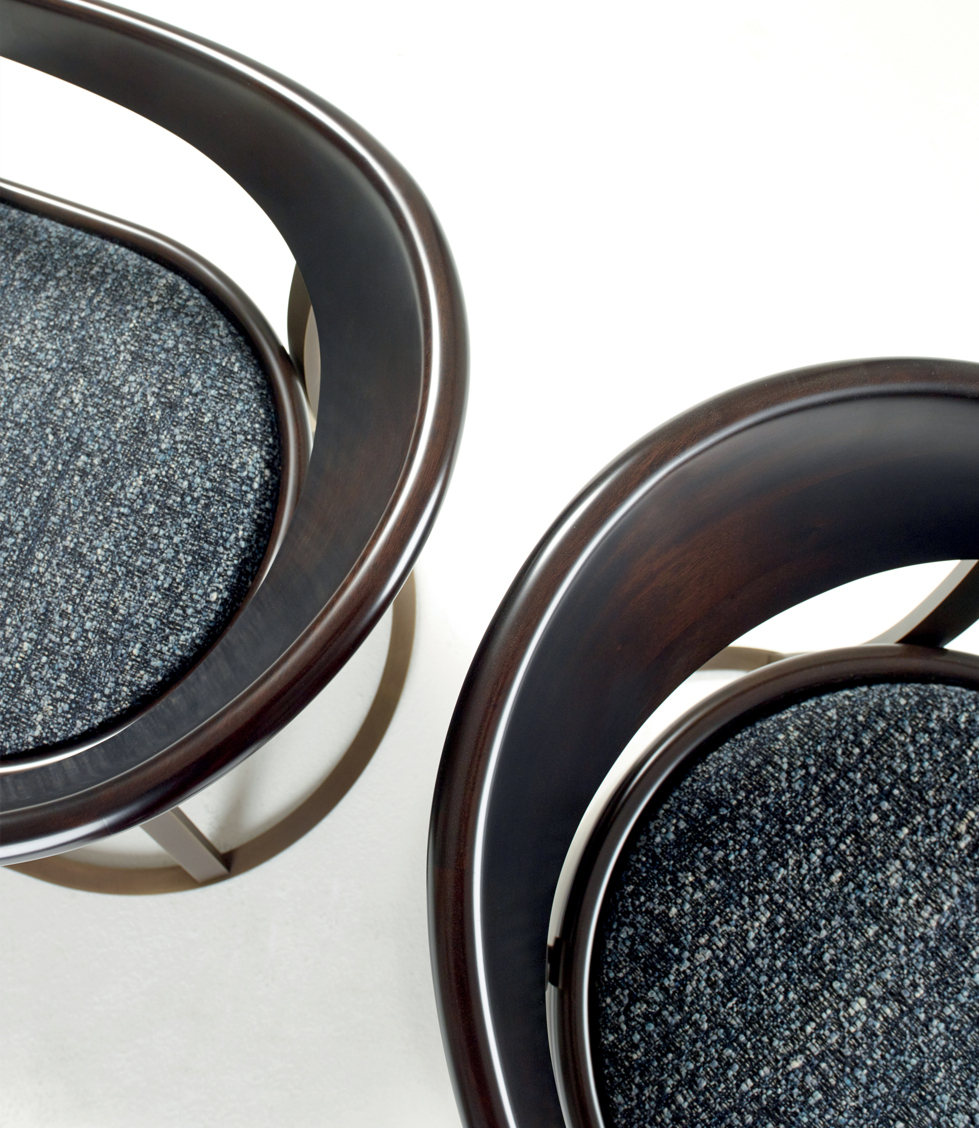 Rachele is a bronze armchair covered in leather, from Promemoria's catalogue | Promemoria