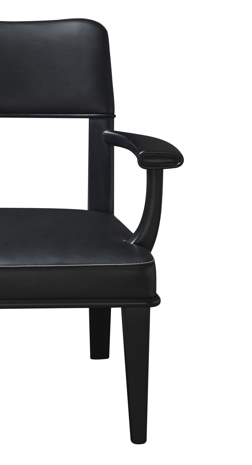 Detail of Vespertine, a wooden lounge armchair with leather seat and back, from Prommeoria's catalogue | Promemoria