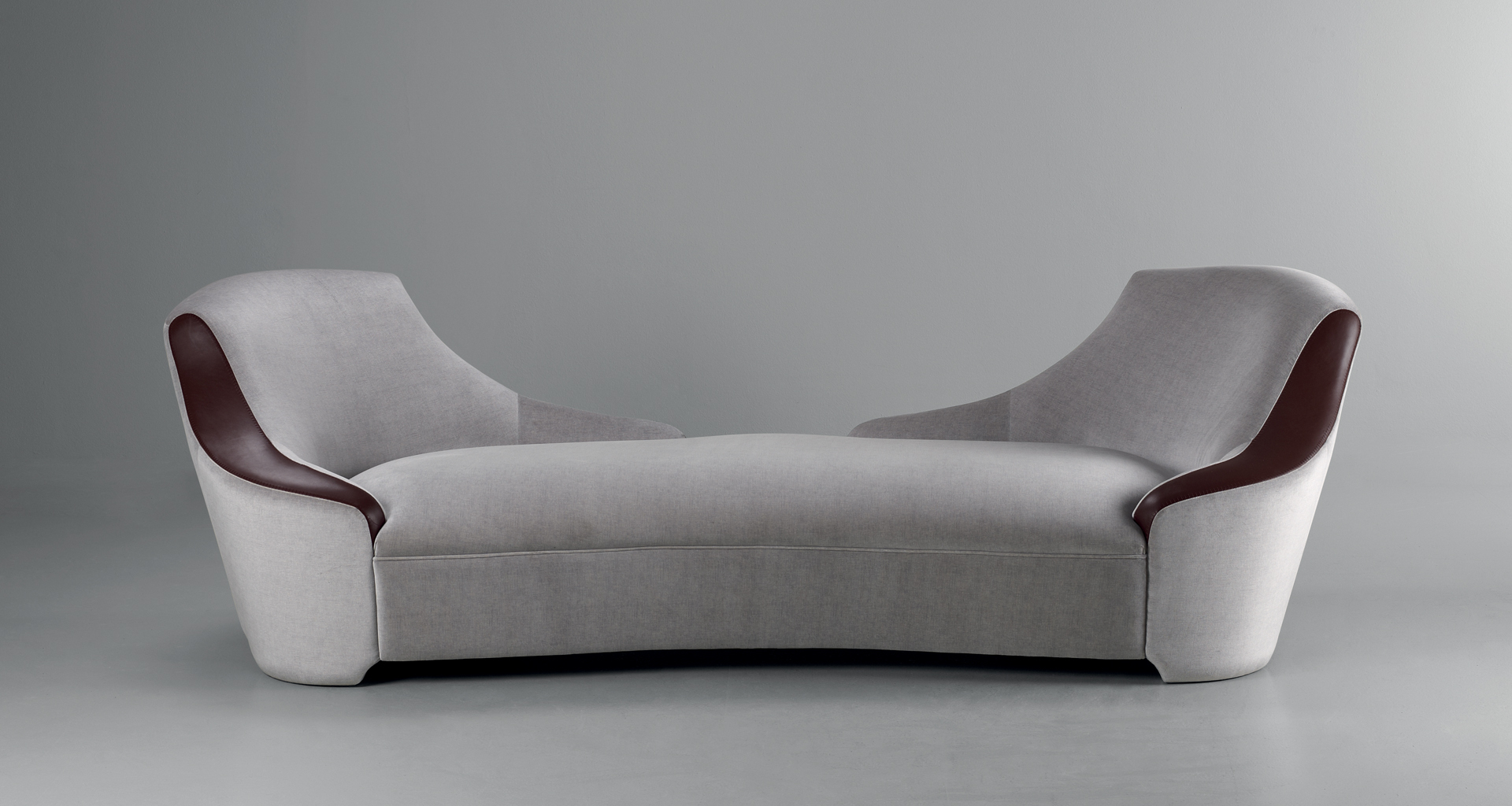 Gioconda is a Dormeuse covered in fabric with leather details, from Promemoria's catalogue | Promemoria