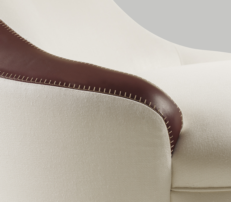 Leather detail of Gioconda, a chaise longue convered in fabric, from Promemoria's catalogue | Promemoria