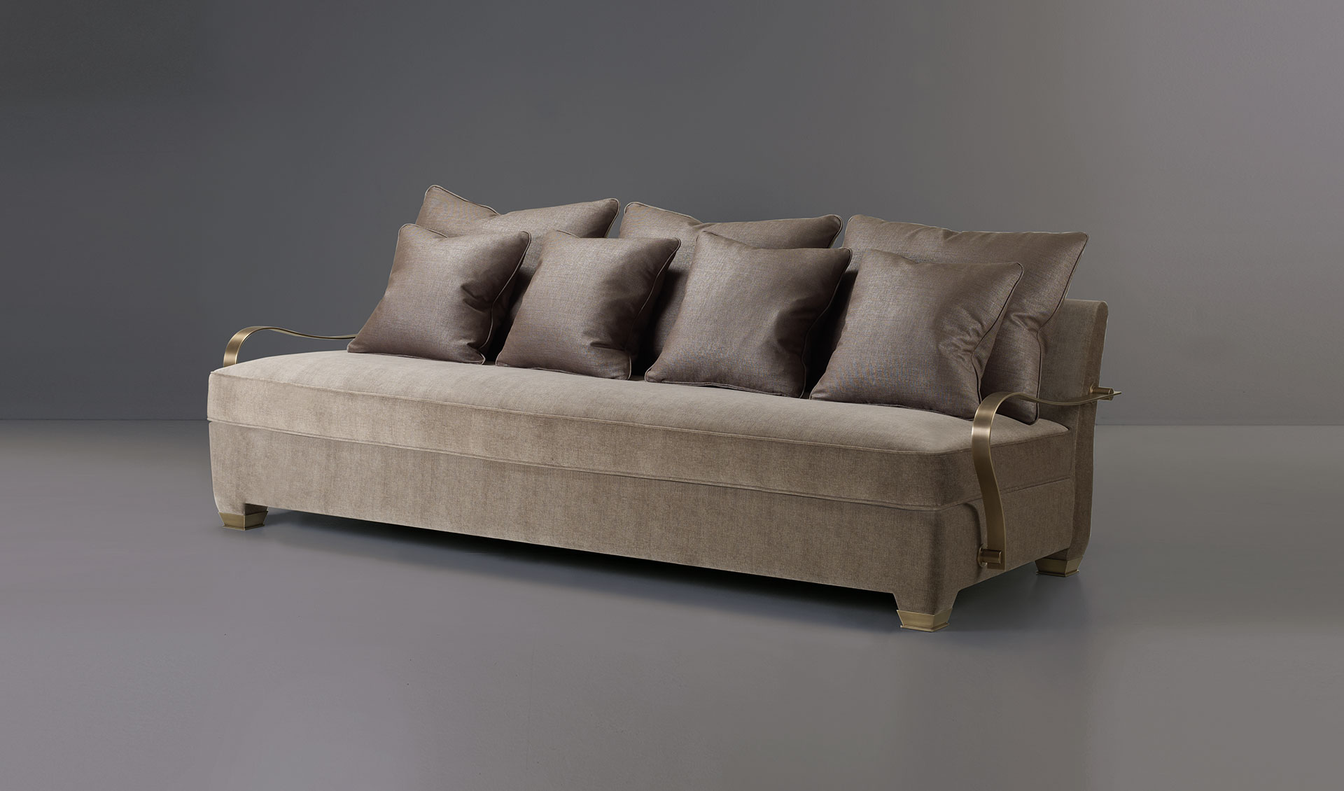 Augusto is a modular and customizable sofa, available with bronze or leather armrests and bronze feet, from Promemoria catalogue | Promemoria