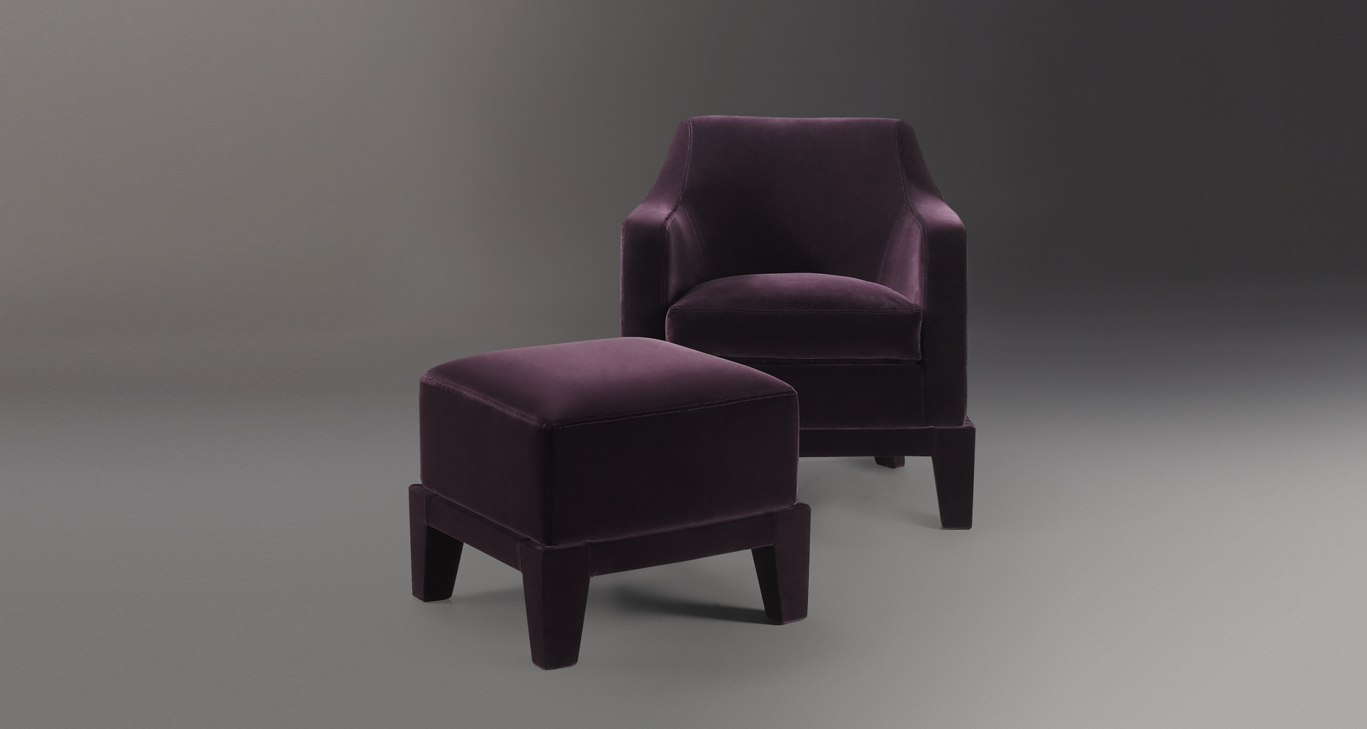 Aziza is a wooden pouf with a cushion covered in fabric or leather, from Promemoria's catalogue | Promemoria