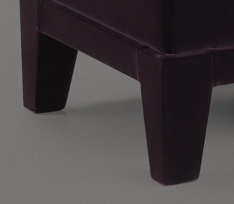 Wooden base detail of Aziza, a wooden pouf with a cushion covered in fabric or leather, from Promemoria's catalogue | Promemoria