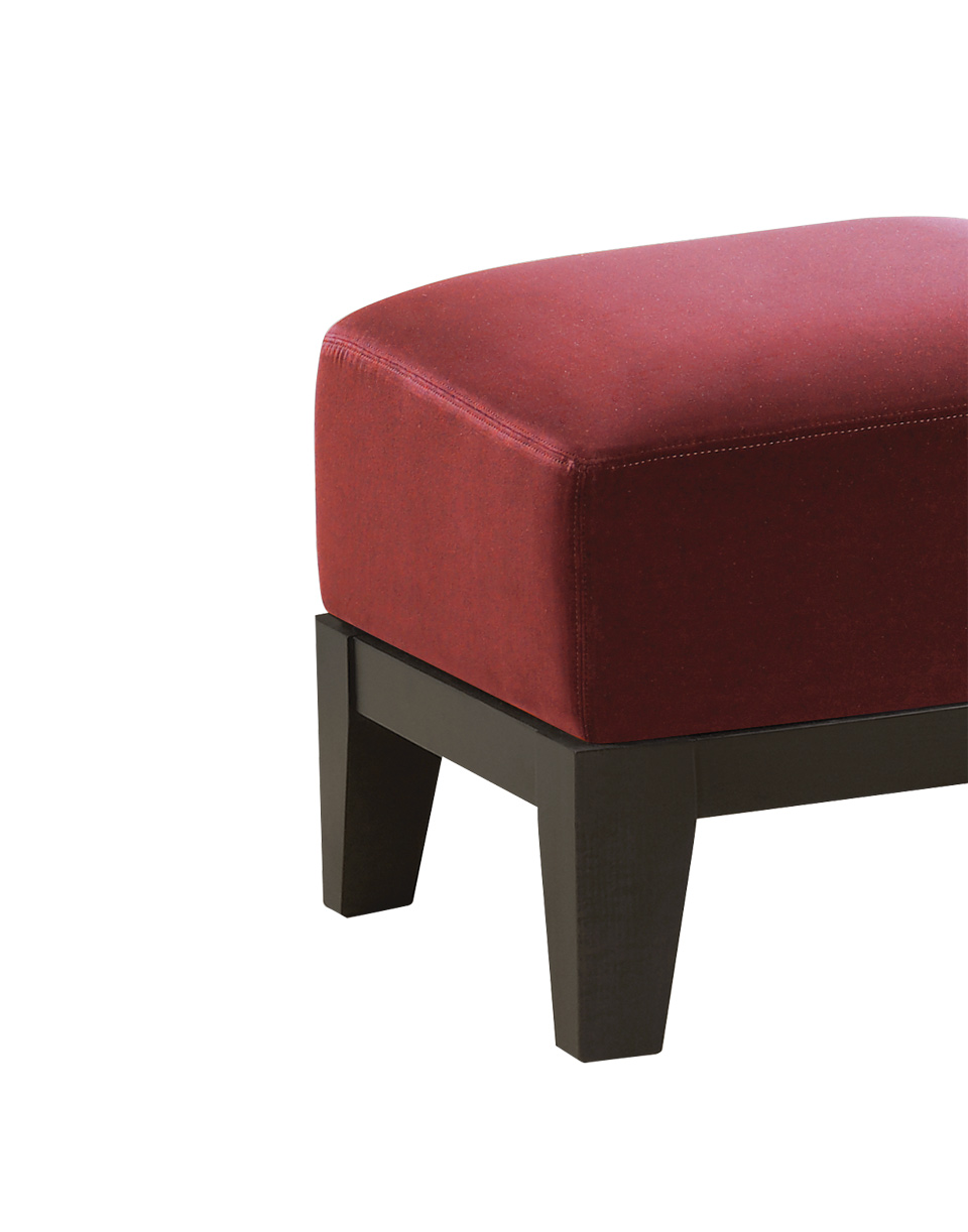 Aziza is a wooden pouf with a cushion covered in fabric or leather, from Promemoria's catalogue | Promemoria