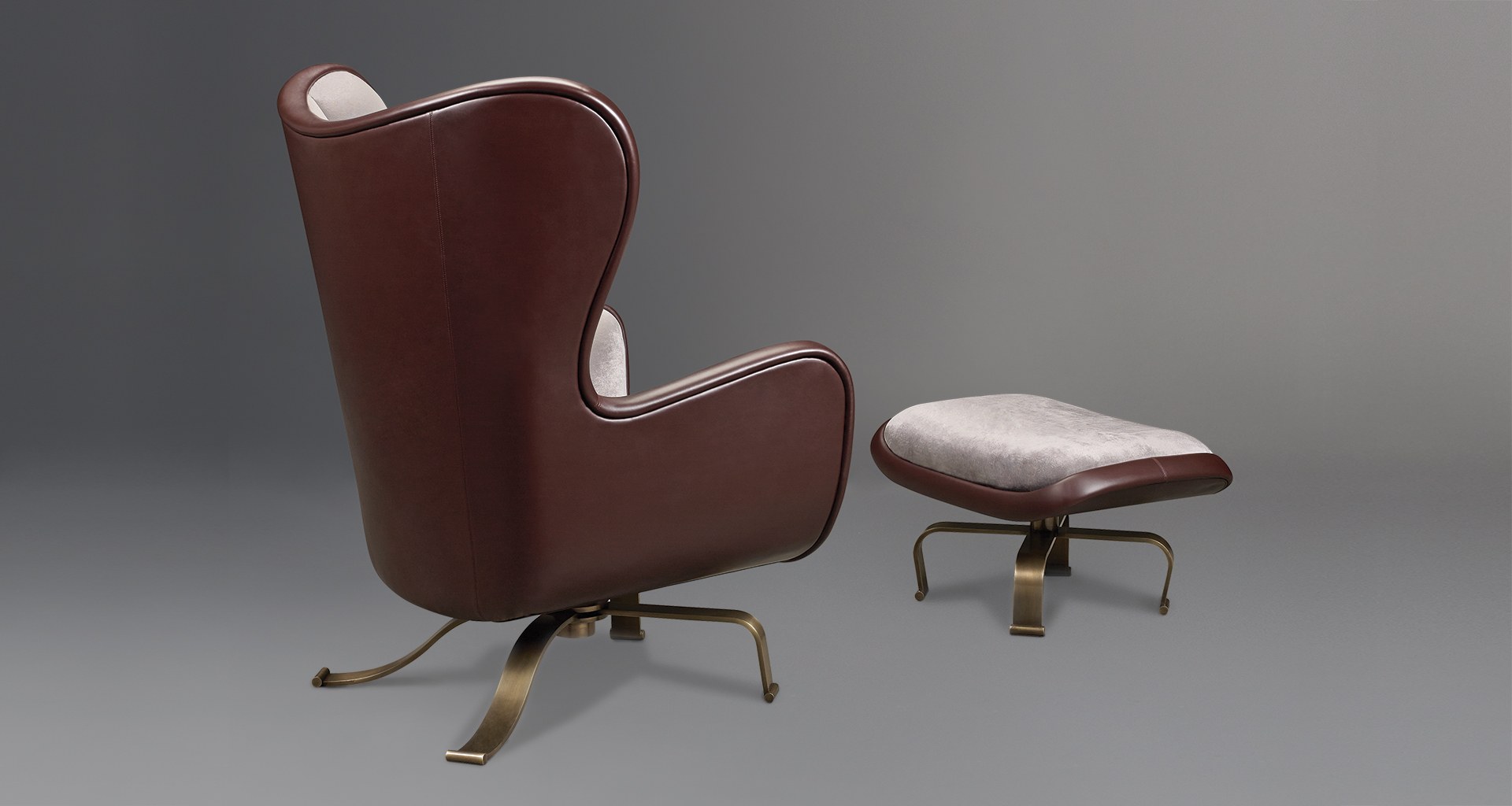 Butterfly is a pouf covered in leather and fabric with a metal base, available with wheels, from Promemoria's catalogue | Promemoria