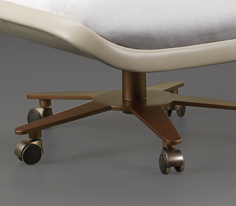 Metal base with wheels detail of Butterfly, a pouf covered in leather and fabric, from Promemoria's catalogue | Promemoria