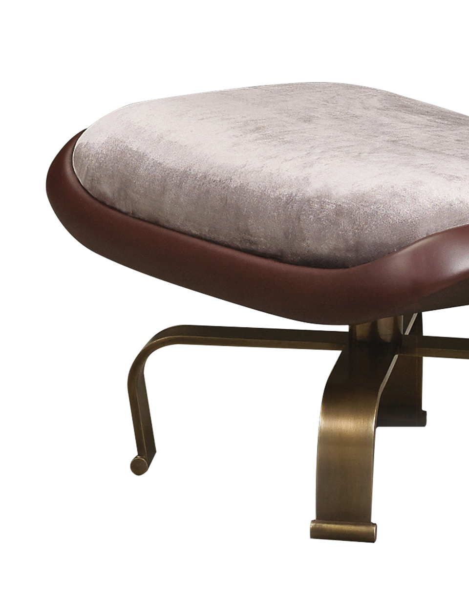 Butterfly is a pouf covered in leather and fabric with a metal base, available with wheels, from Promemoria's catalogue | Promemoria