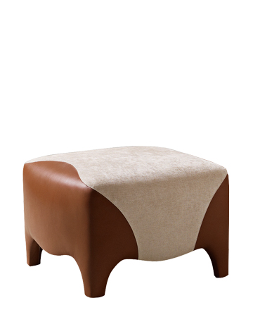 Club is a pouf covered in fabric and leather, from Promemoria's catalogue | Promemoria