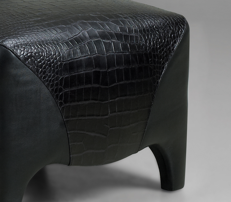 Detail of Club, a pouf covered in fabric and leather, from Promemoria's catalogue | Promemoria