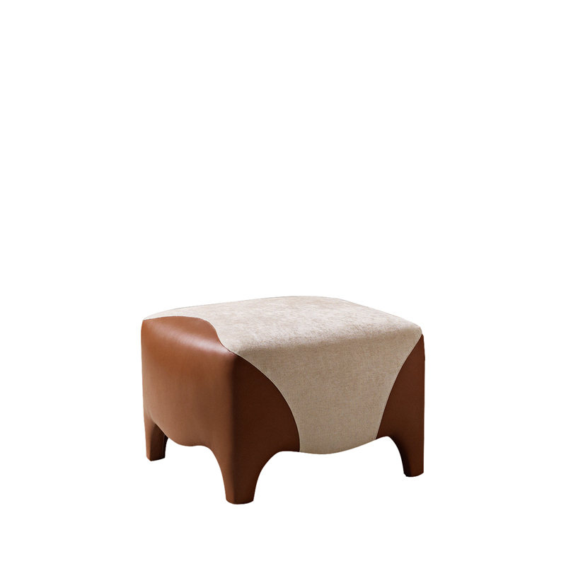 Club is a pouf covered in fabric and leather, from Promemoria's catalogue | Promemoria