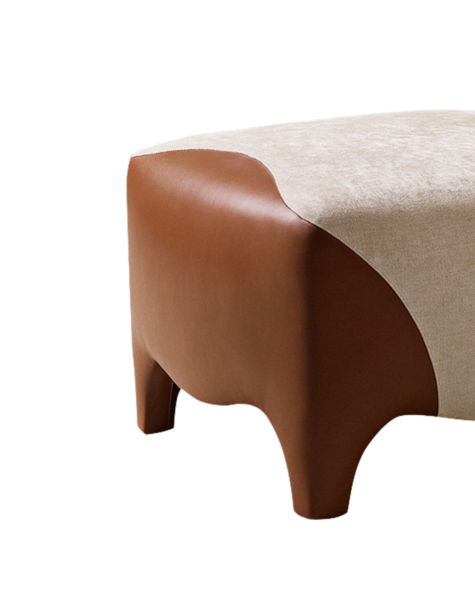 Detail of Club, a pouf covered in fabric and leather, from Promemoria's catalogue | Promemoria
