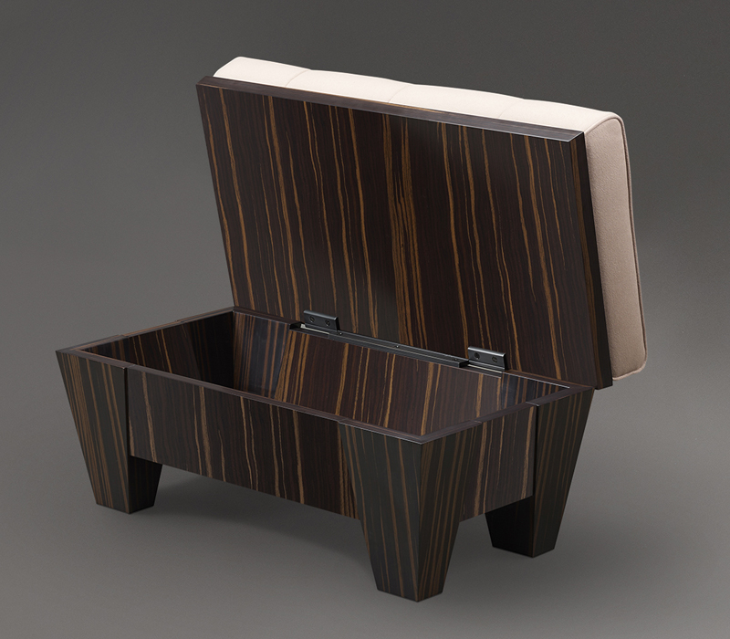 Open Gertrude, a wooden pouf container covered in capitonnè fabric, from Promemoria's Lake Tales collection | Promemoria