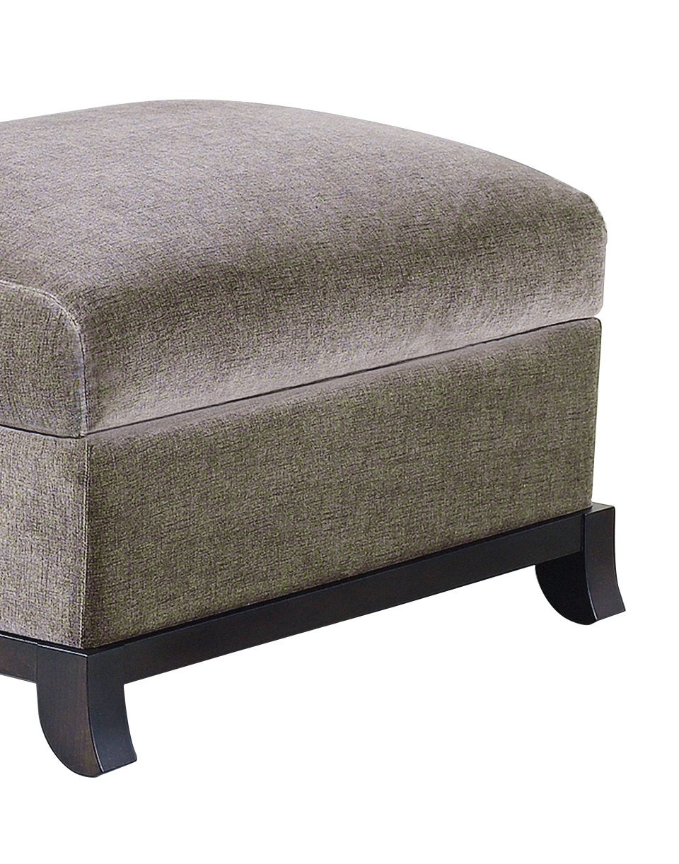 Madame A is a wooden pouf covered in fabric or leather, from Promemoria's catalogue | Promemoria