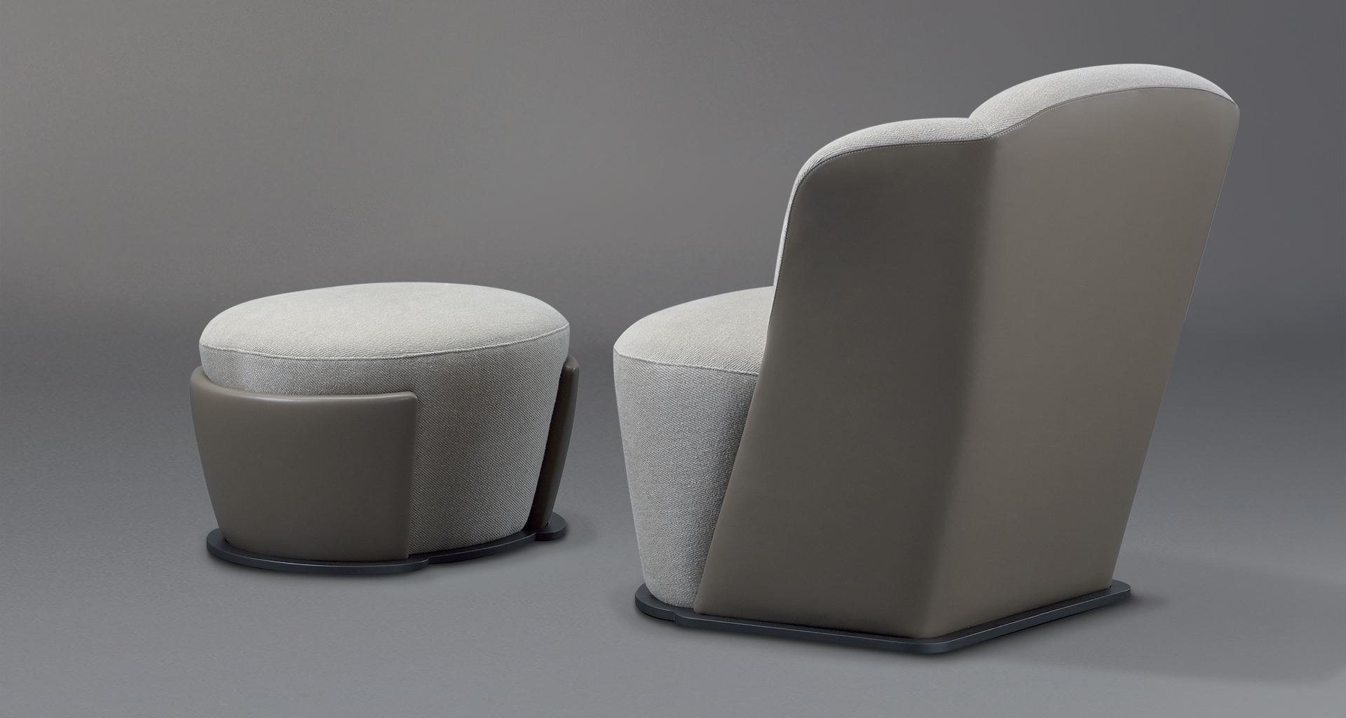 Rosaspina is a pouf covered in fabric and leather and a metal base, from Promemoria's catalogue | Promemoria