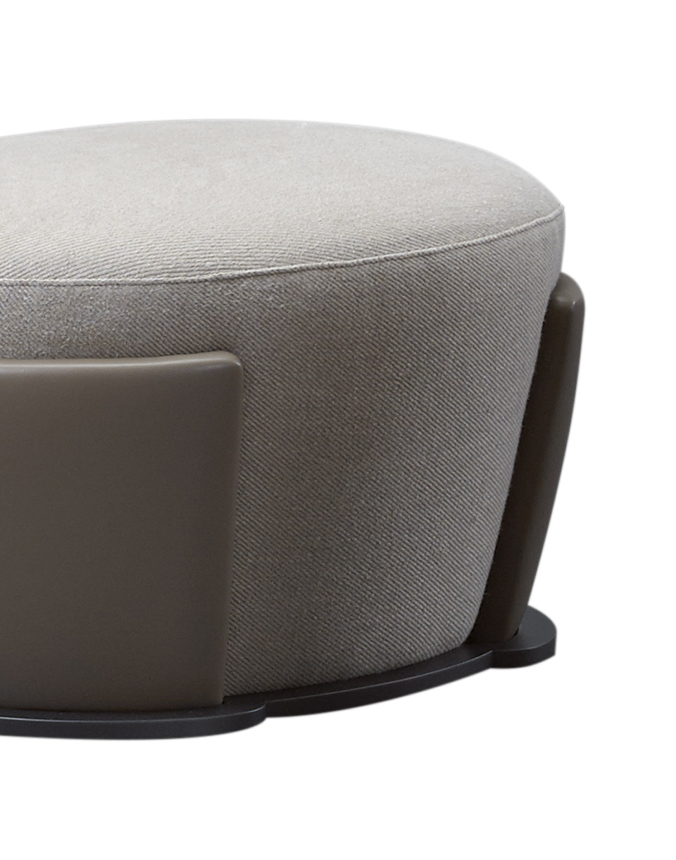 Rosaspina is a pouf covered in fabric and leather and a metal base, from Promemoria's catalogue | Promemoria