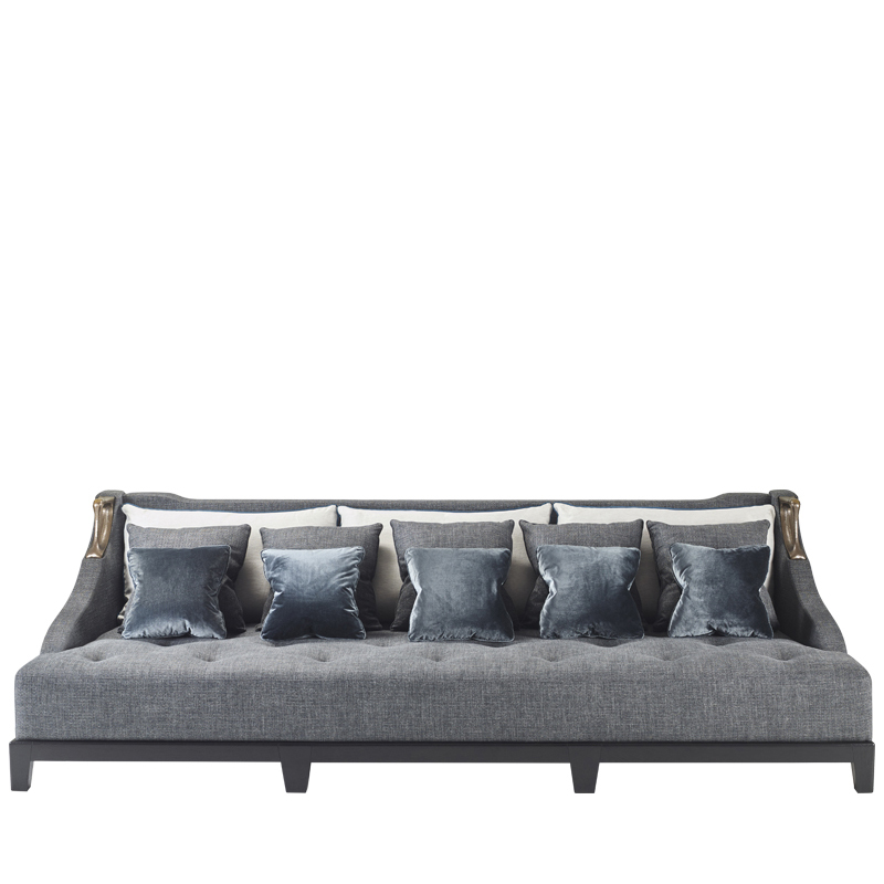 Albert is a wooden sofa covered in fabric with two bronze handles on the sides, from Promemoria's catalogue | Promemoria