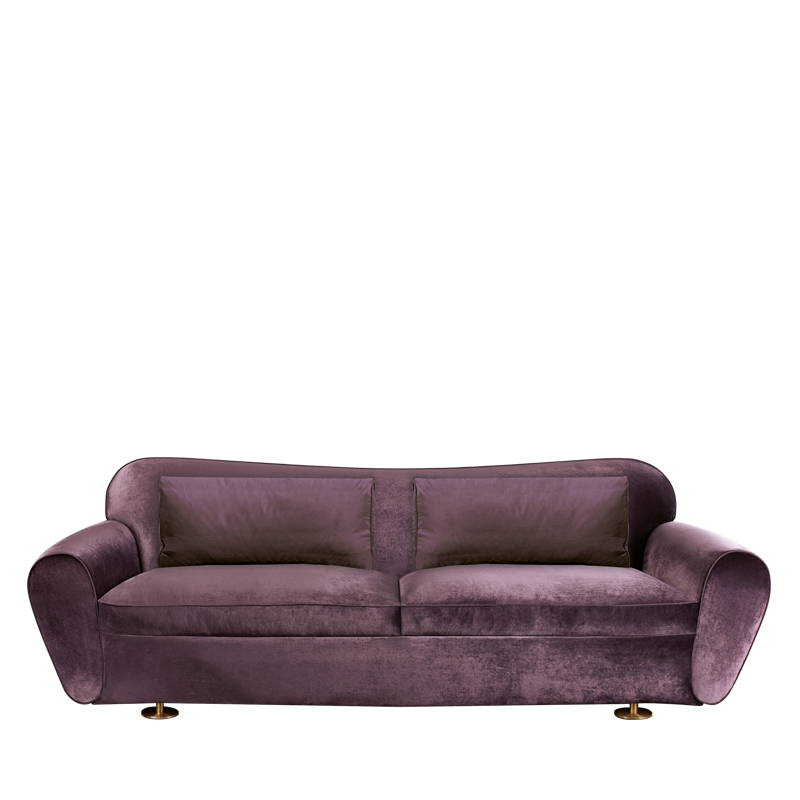Artù è un divano rivestito in tessuto con piedini in bronzo, del catalogo di Promemoria | Promemoria