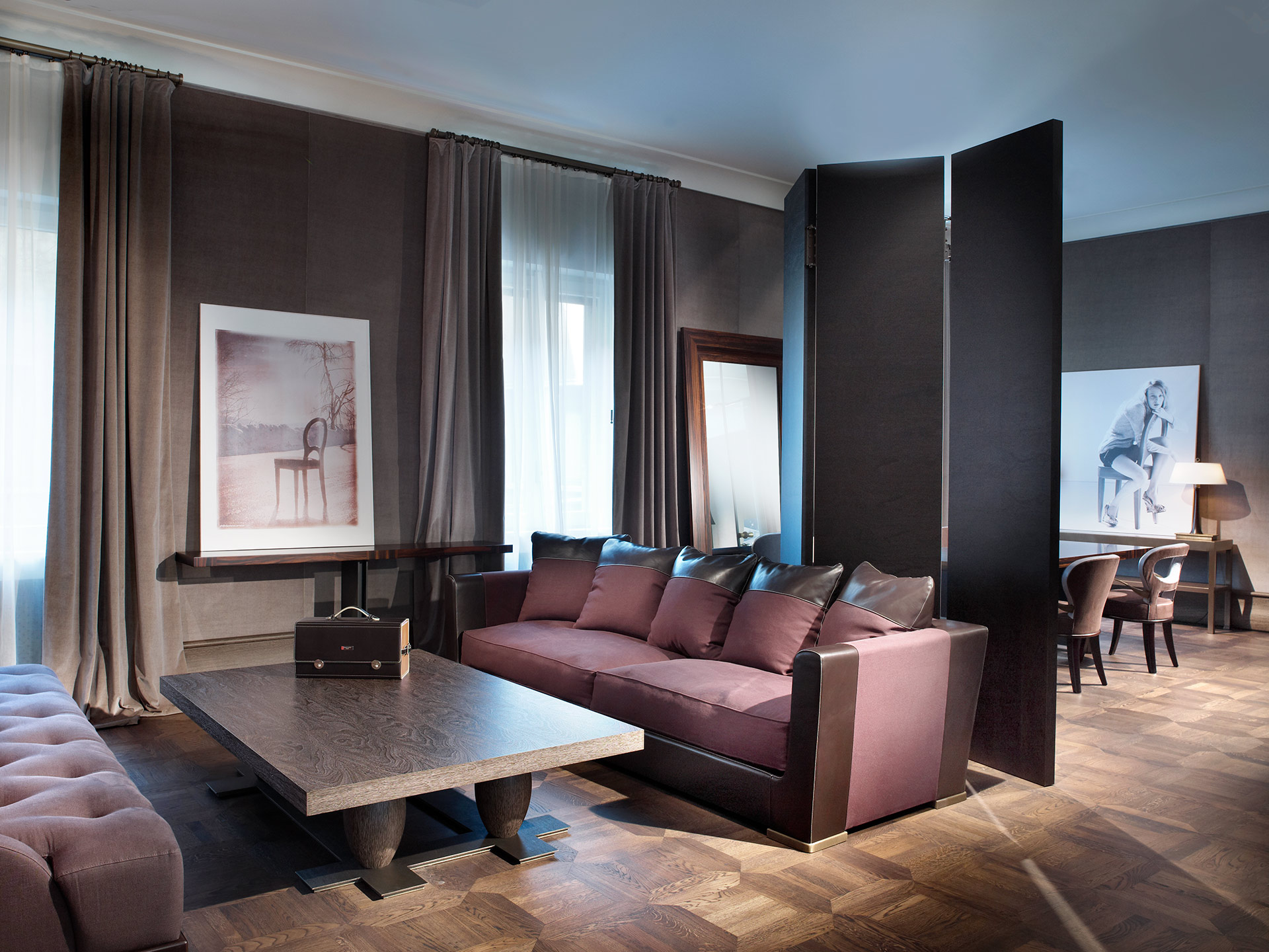 Dolce Vita is a sofa covered in fabric with leather details and bronze feet, from Promemoria's catalogue | Promemoria