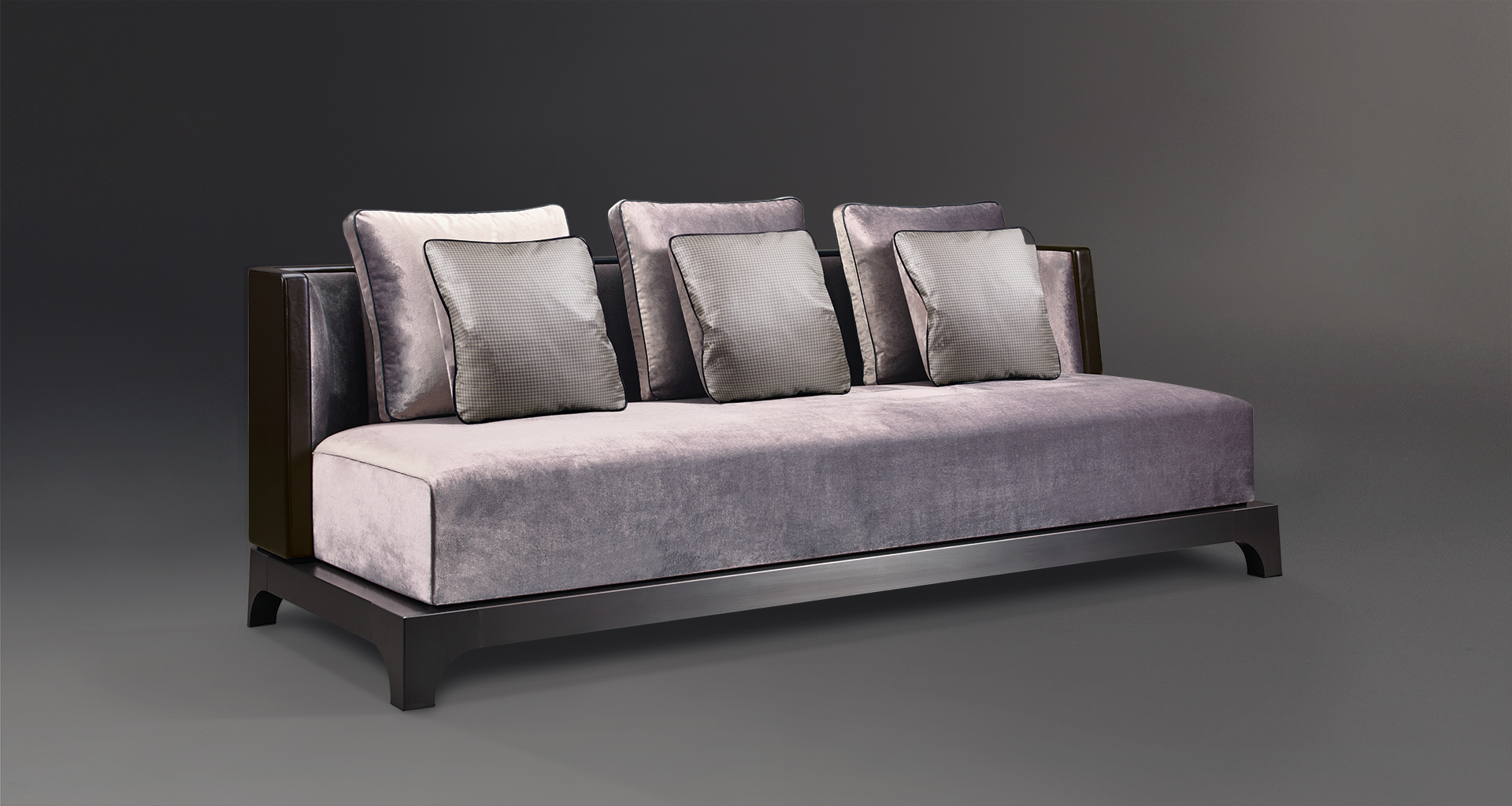 Eaton is a sofa with a wooden or bronze base covered in fabric, from Promemoria's The London Collection | Promemoria
