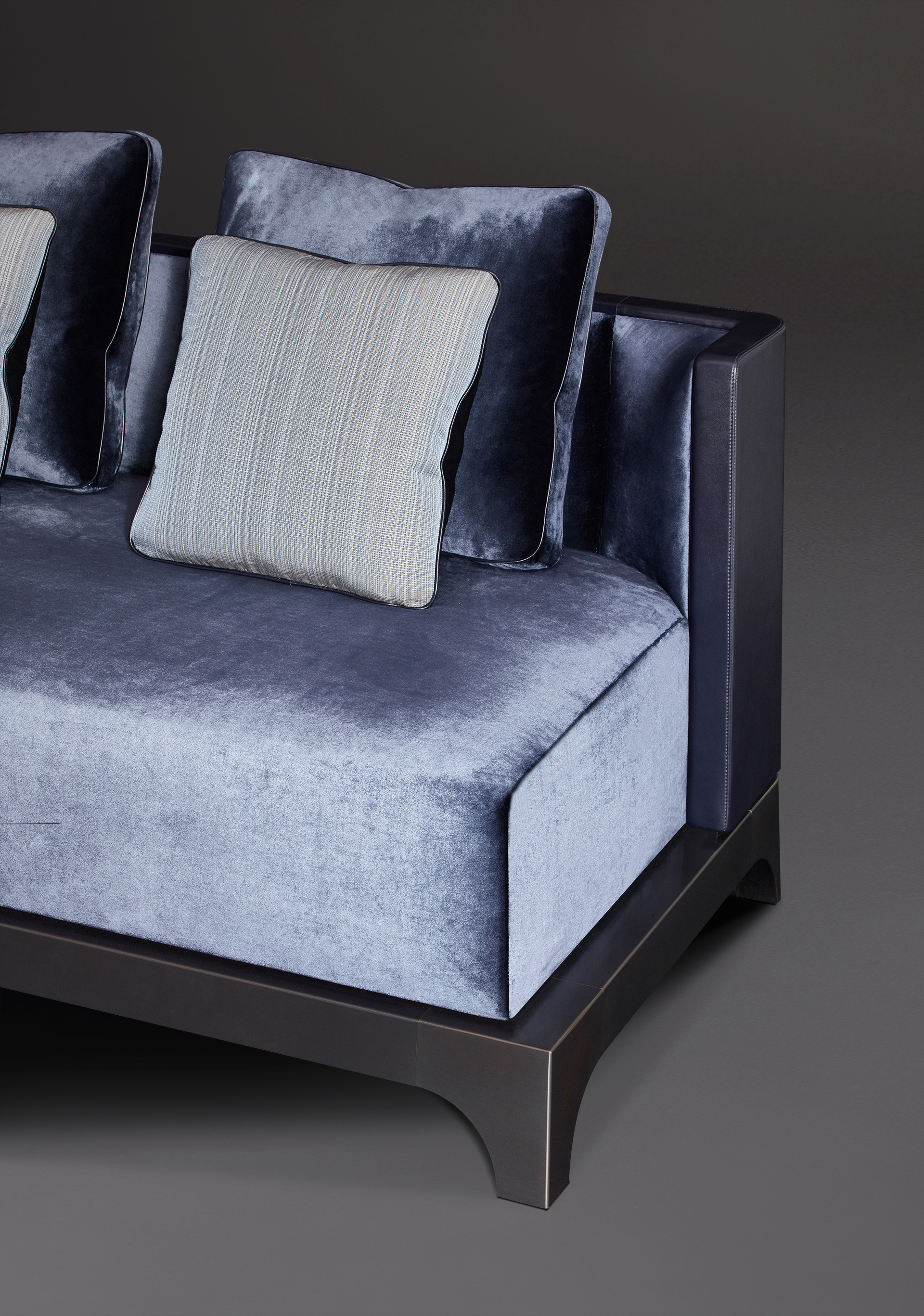 Detail of Eaton, a sofa with a wooden or bronze base covered in fabric, from Promemoria's The London Collection | Promemoria
