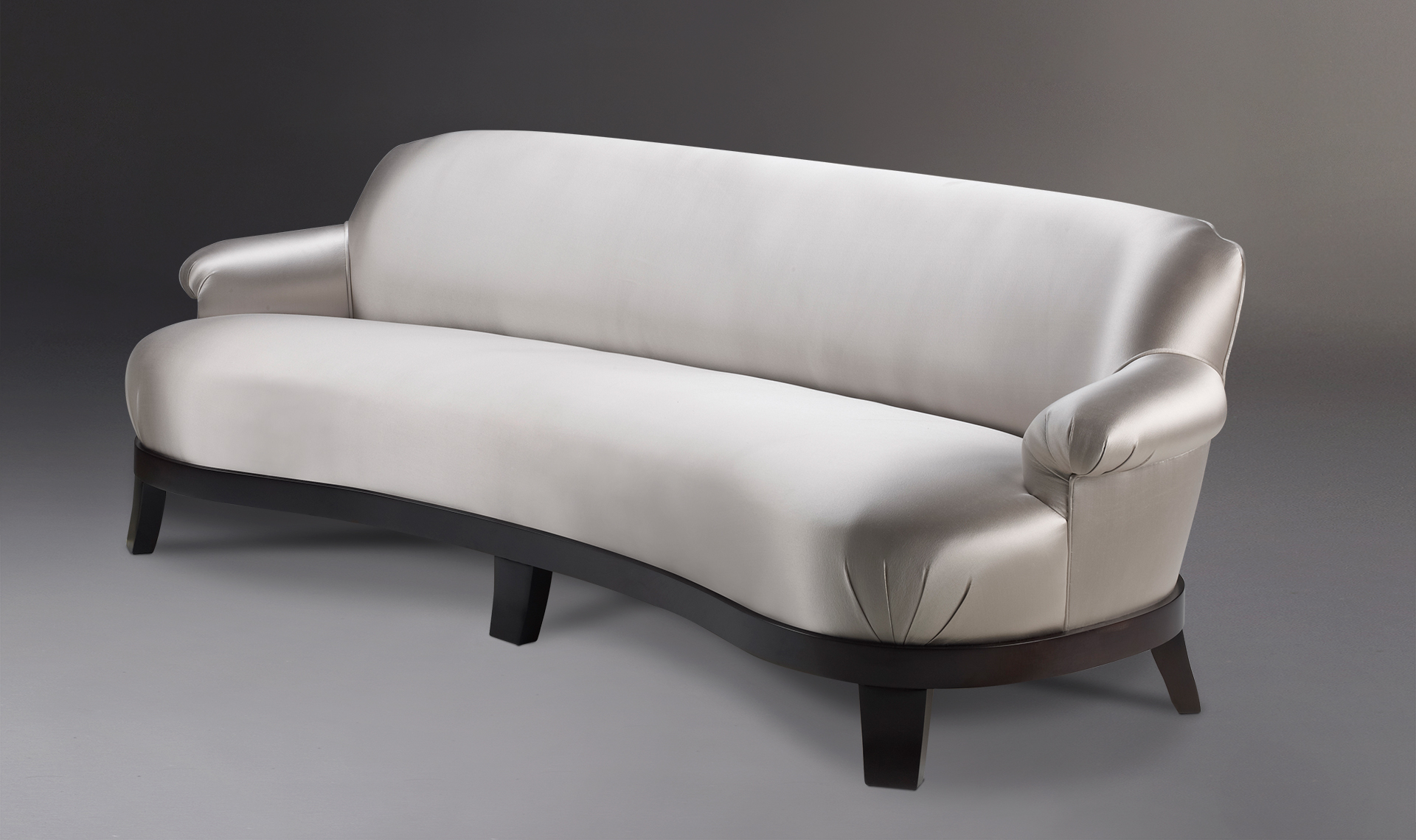 Gacy is a wooden sofa covered in fabric or leather, from Promemoria's catalogue | Promemoria