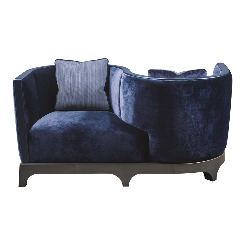 Grosvenor is a wooden loveseat covered in fabric with leather details and bronze base, from Promemoria's The London Collection | Promemoria