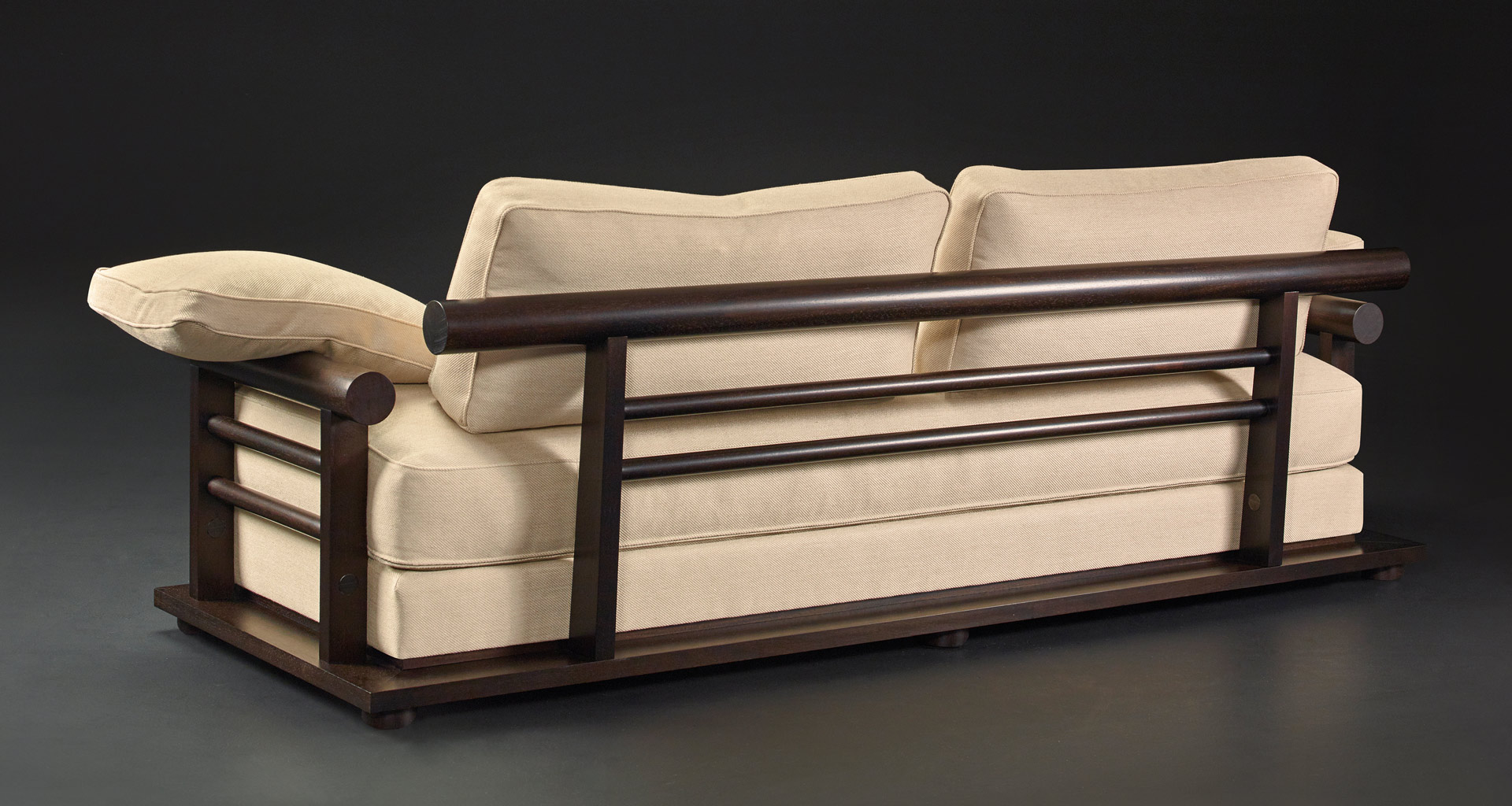 Wooden structure detail Nocturne, a sofa covered in fabric or leather, from Promemoria's Night Tales collection | Promemoria