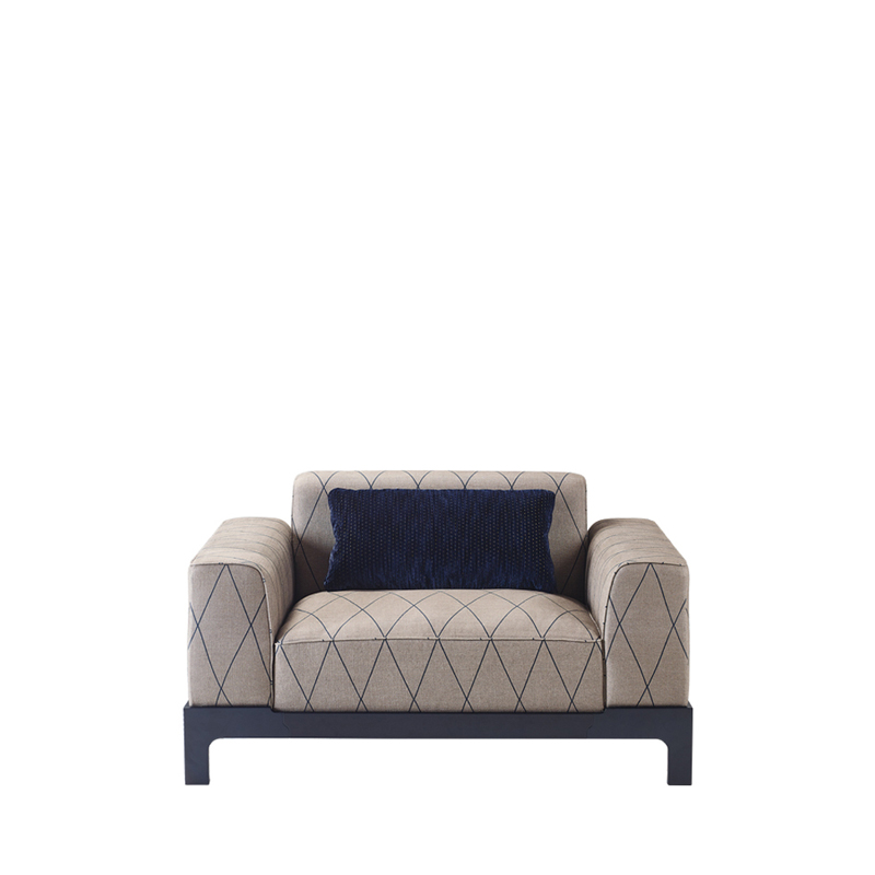 Pullman is a wooden sofa with fabric covering and cushions, from Promemoria's Indigo Tales collection | Promemoria