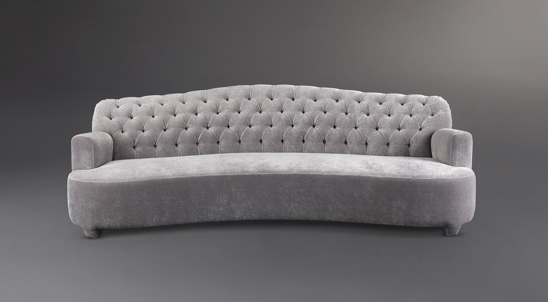 Rodolfo is a sofa covered in velvet with a capitonnè backrest, from Promemoria's catalogue | Promemoria