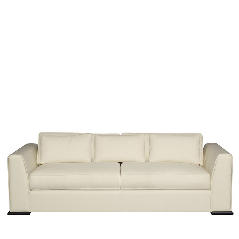 Ulderico is a wooden sofa covered in fabric from Promemoria's catalogue | Promemoria