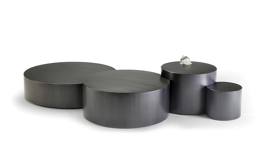 Edon is a bronze coffee table, with four units embedded, from Promemoria's Indigo Tales collection | Promemoria