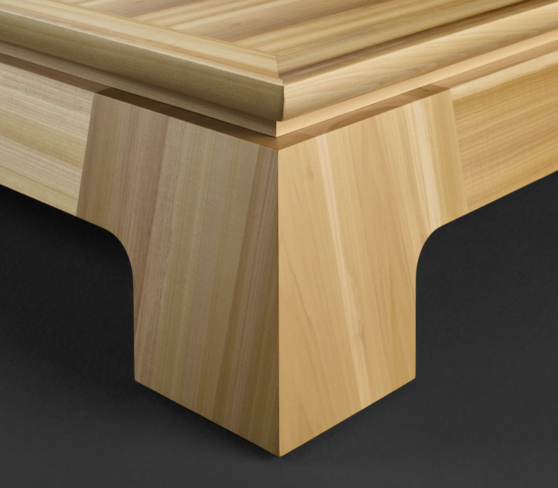 Feet detail of Plenilune, an impressive wooden coffee table available with leather, bronze or marble top interior, from Promemoria's catalogue | Promemoria