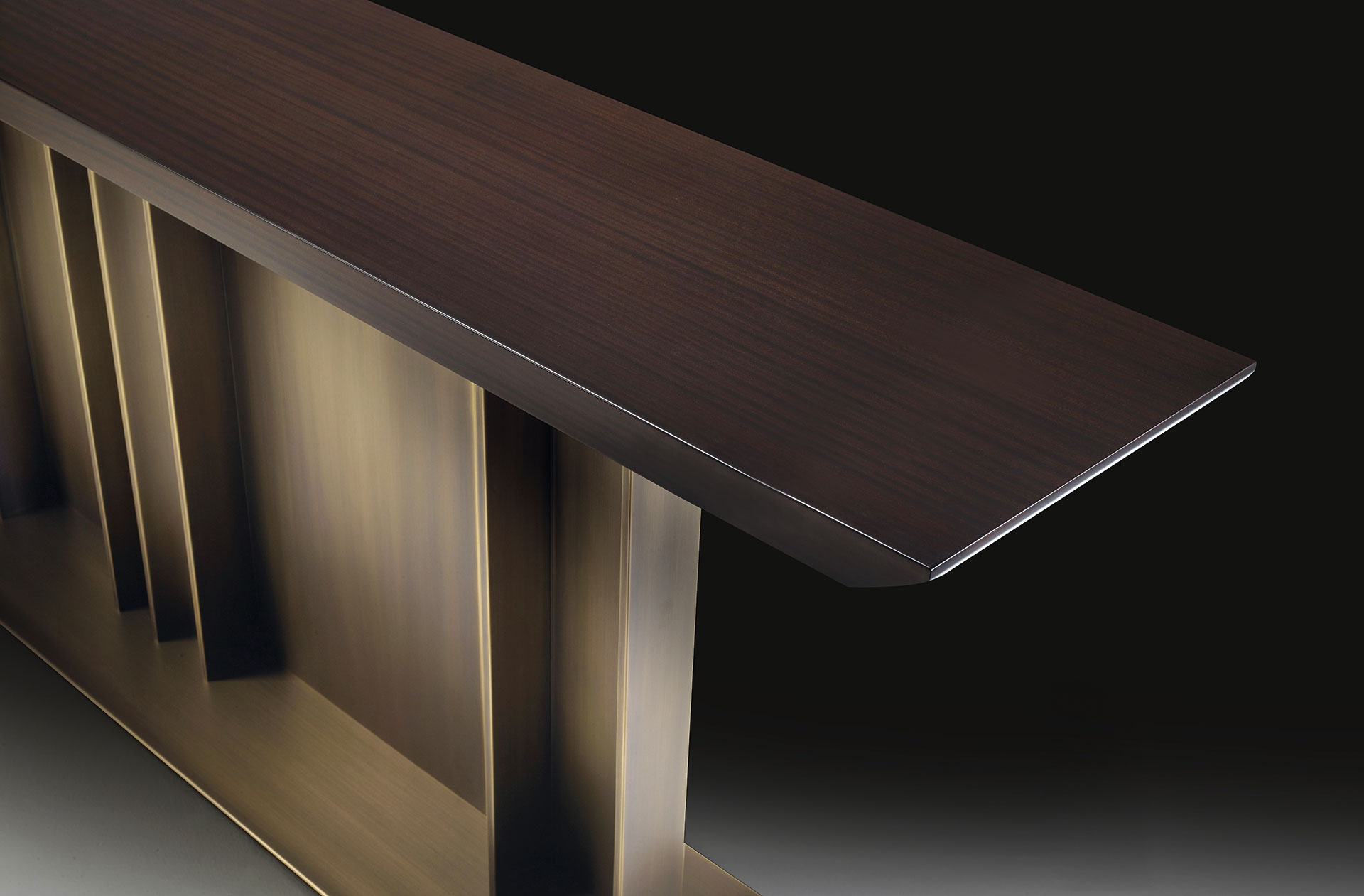 Nila is a console with bronze base and wooden top, from Promemoria's Indigo Tales collection | Promemoria