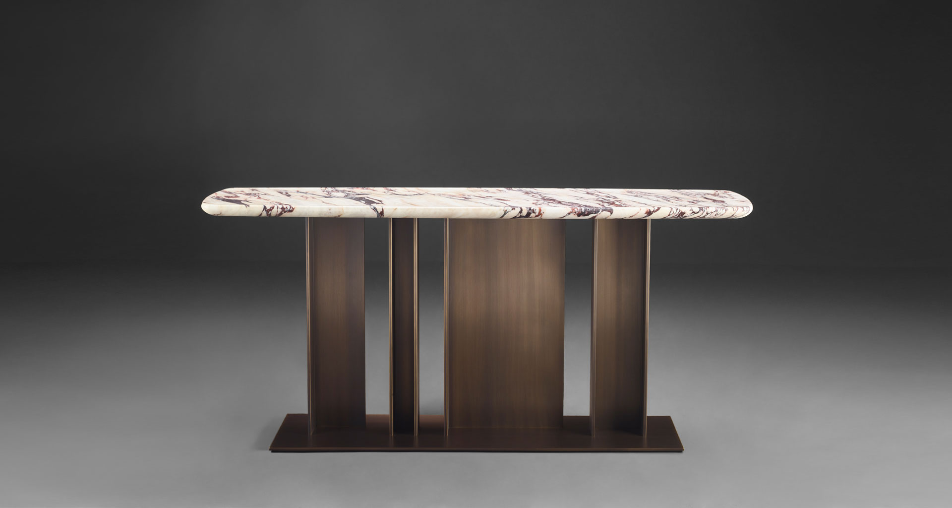 Nila is a console with bronze base and wooden top, from Promemoria's Indigo Tales collection | Promemoria
