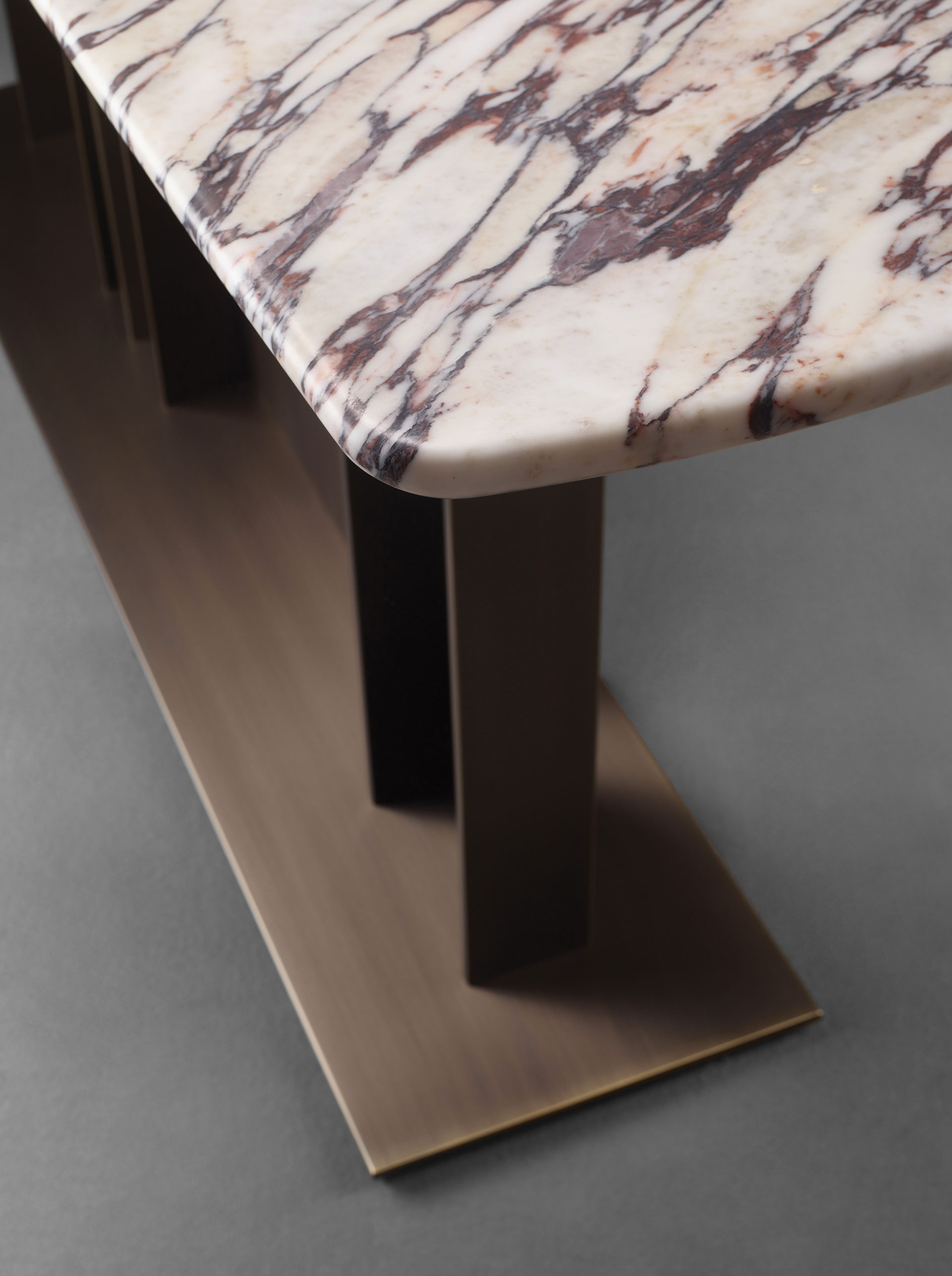 Nila is a console with bronze base and wooden top, from Promemoria's Indigo Tales collection | Promemoria