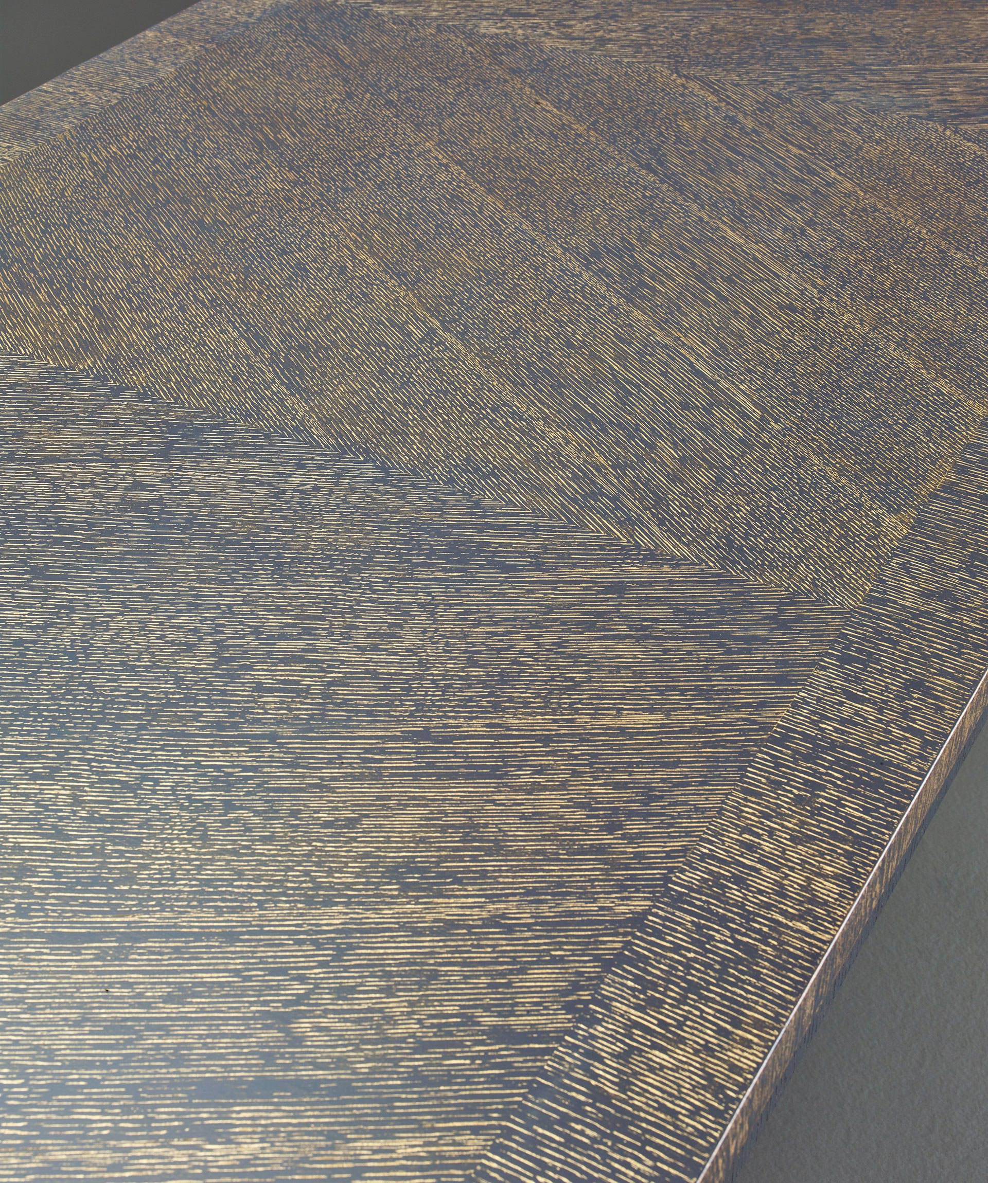Top detail of Cadogan, a bronze dining table with available in different finishes, from Promemoria's The London Collection | Promemoria