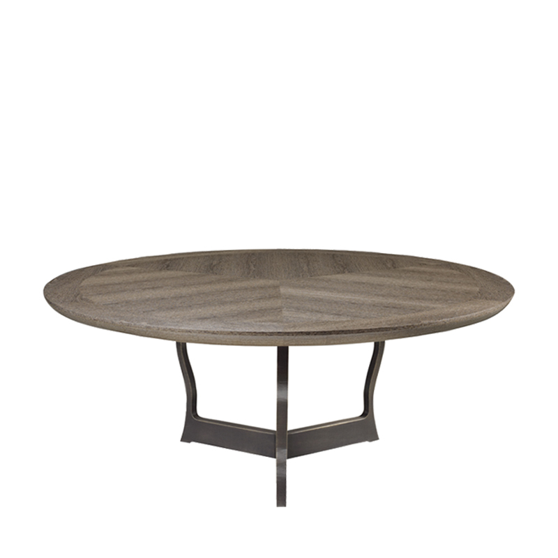 Erasmo is a bronze dining table with wooden or leather top, from Promemoria's catalogue | Promemoria