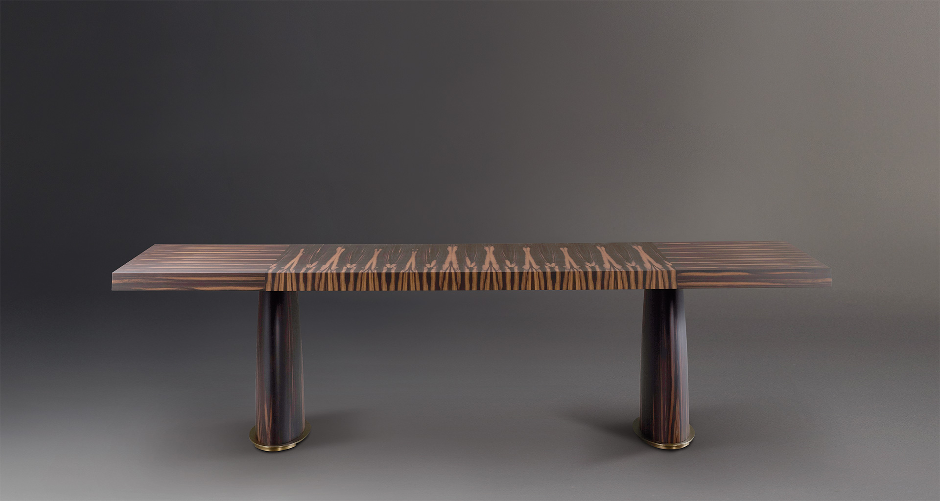 Goffredo is a wooden dining table with a bronze base and checked or striped top, from Promemoria's catalogue | Promemoria