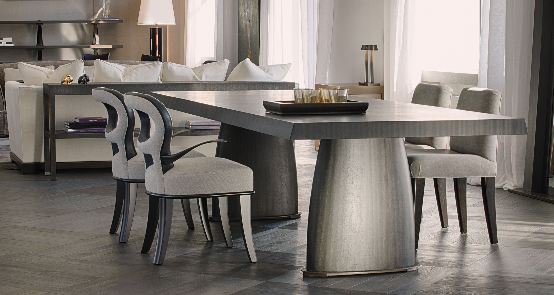 Goffredo is a wooden dining table with a bronze base and checked or striped top, from Promemoria's catalogue | Promemoria