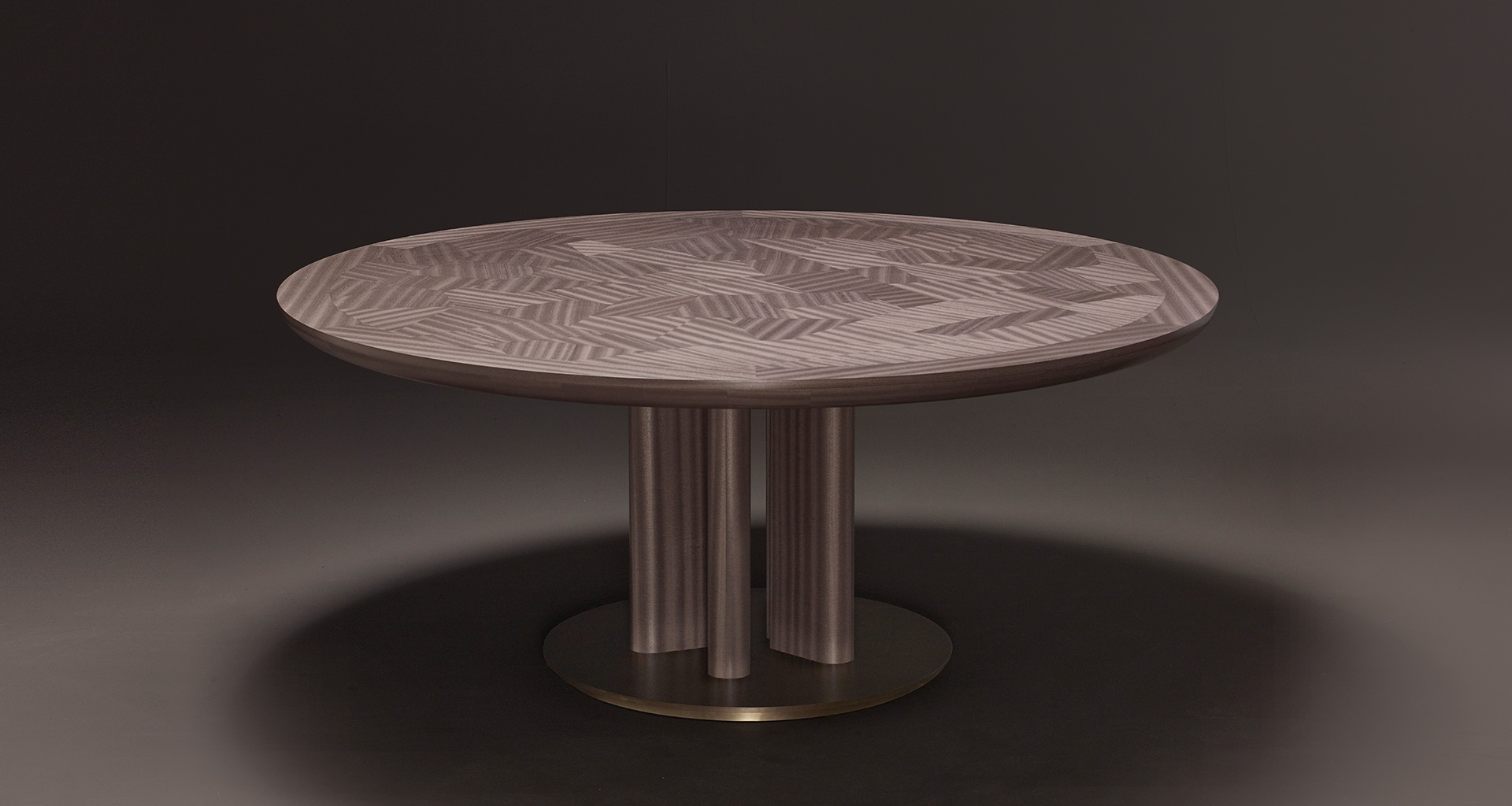 Orazio is a wooden and bronze dining table, from Promemoria's Amaranthine Tales collection | Promemoria