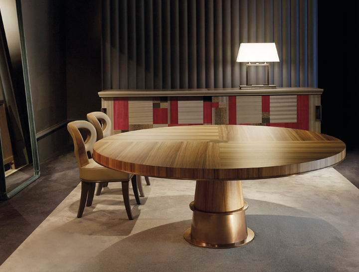 Tornasole is a dining table available in different sizes and can be made of wood, marble or onyx with bronze decorations and details, from Promemoria's catalogue | Promemoria
