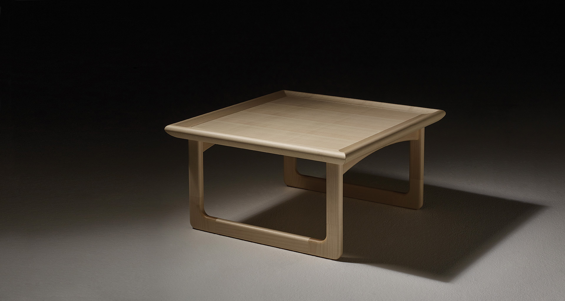 Beginning as a tray for breakfast in bed, it finds another use as a small table.