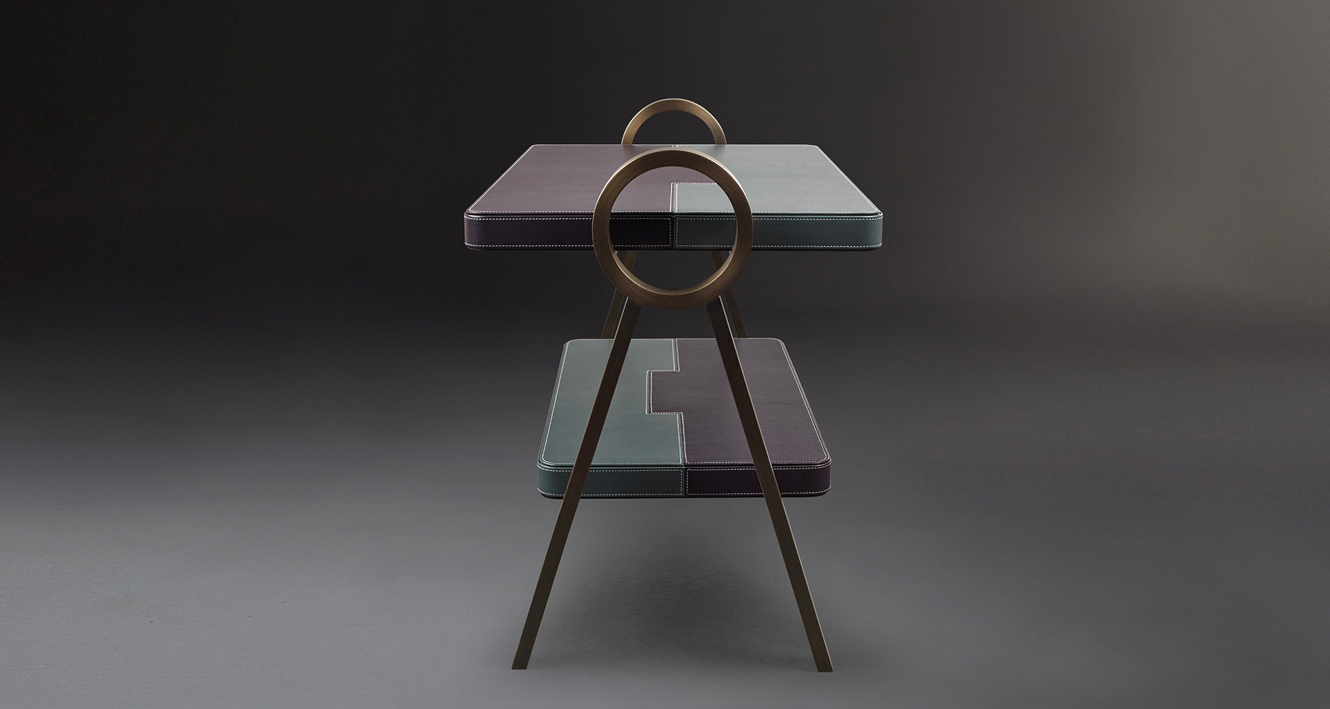 Atlantique is a bronze small table with leather top, from Promemoria's Capsule Collection by Olivier Gagnère | Promemoria