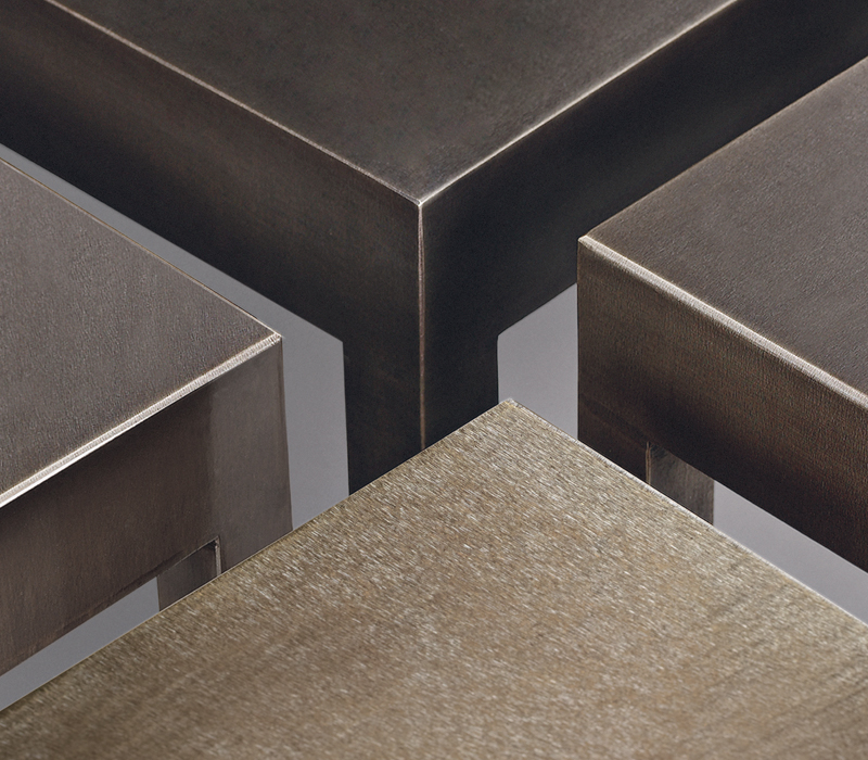 Top detail of Gong, a bronze small table with glass top, from Promemoria's catalogue | Promemoria
