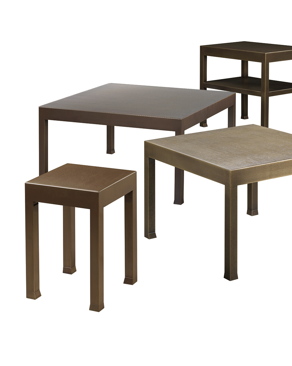 Gong is a bronze small table with glass top, from Promemoria's catalogue | Promemoria