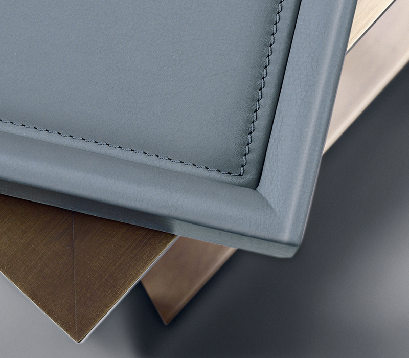 Leather tray detail of Scarlett, a bronze small table with wheels and a removable leather tray, from Promemoria's catalogue | Promemoria